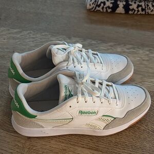 Green Reebok sneakers